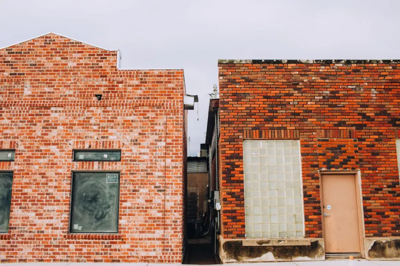 Moisture, Mold, and Failed Inspections: What Your Building's Exterior Is Hiding